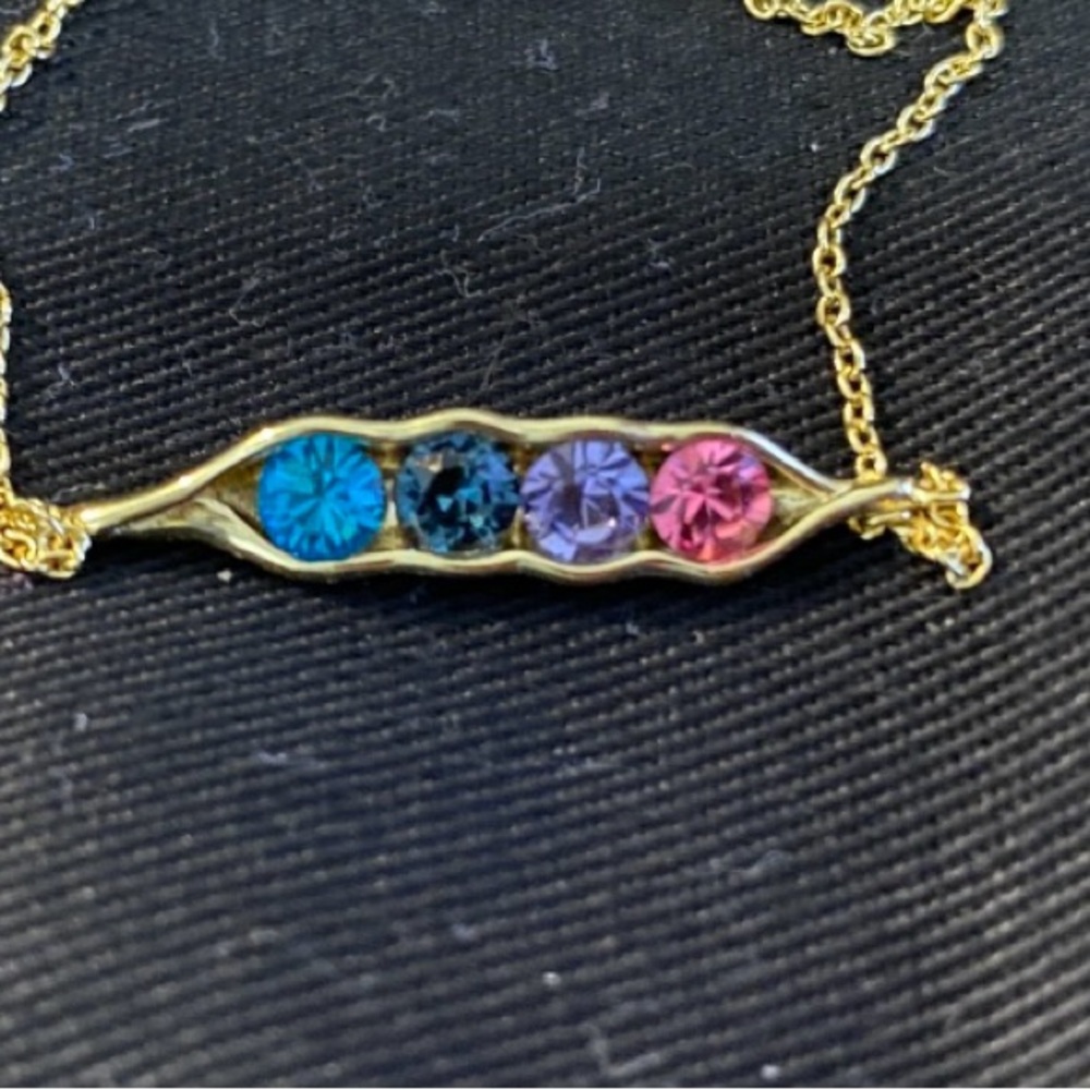 Gold Sterling Silver plated pea bracelet with 4 stunning stones.
